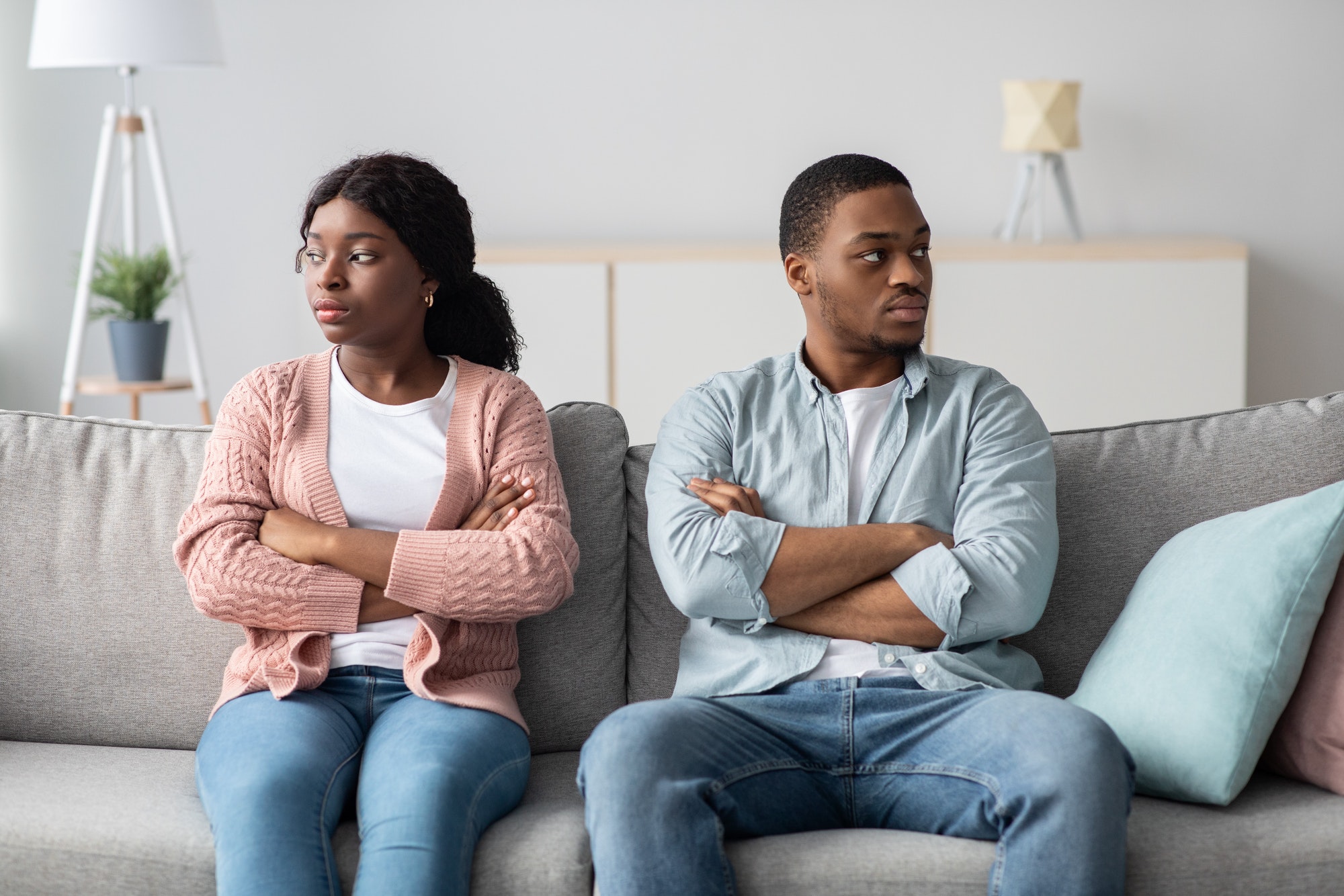 Disappointed african american couple having relationships crisis